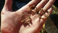 Set of 3 brass viking fibulas. Two types
