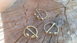 Set of 3 brass viking fibulas. Two types